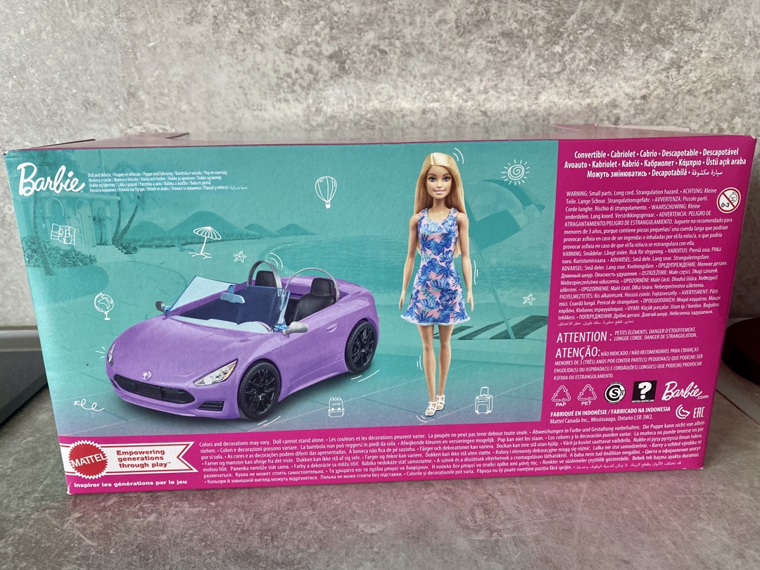 Кукла Barbie в кола